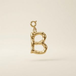 Charm – lettre alphabétique frappée