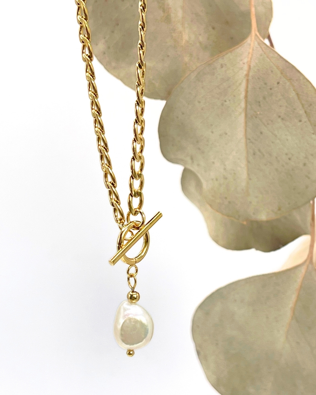 Collier Caractériel acier doré et perle d'eau douce